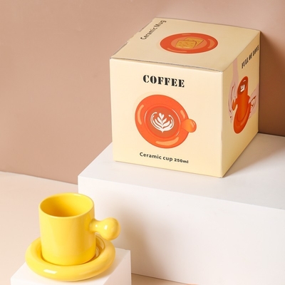Exquisite Nordic Candy Egg Handle Ceramic Cup and Plate Set for Company Employee Gift