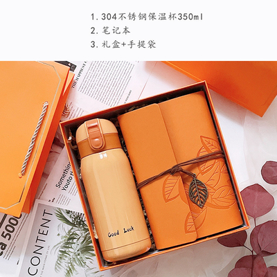 Customized Color Orange Fashion Entry Gift with Hand Warm Cup Notebook Good Luck Pendant